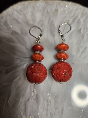 Red Carved Cinnabar And Sponge Coral Earrings